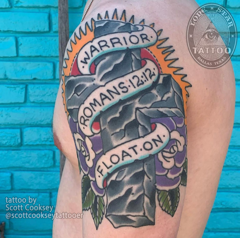 Traditional cross roses tattoo by Scott Cooksey