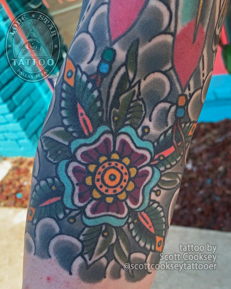 Japanese traditional floral sleeve tattoo by Scott Cooksey