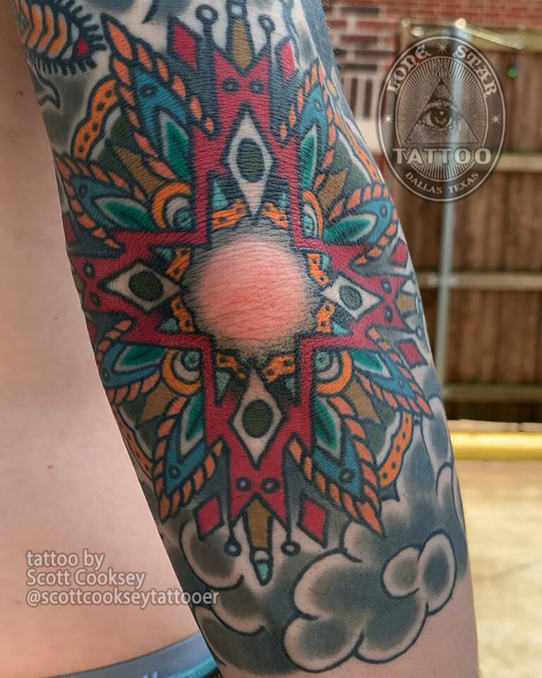 Traditional mandala tattoo by Scott Cooksey