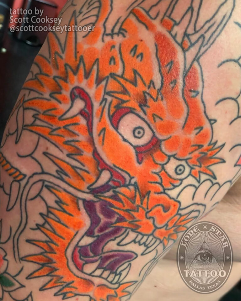 Japanese traditional golden dragon tattoo by Scott Cooksey