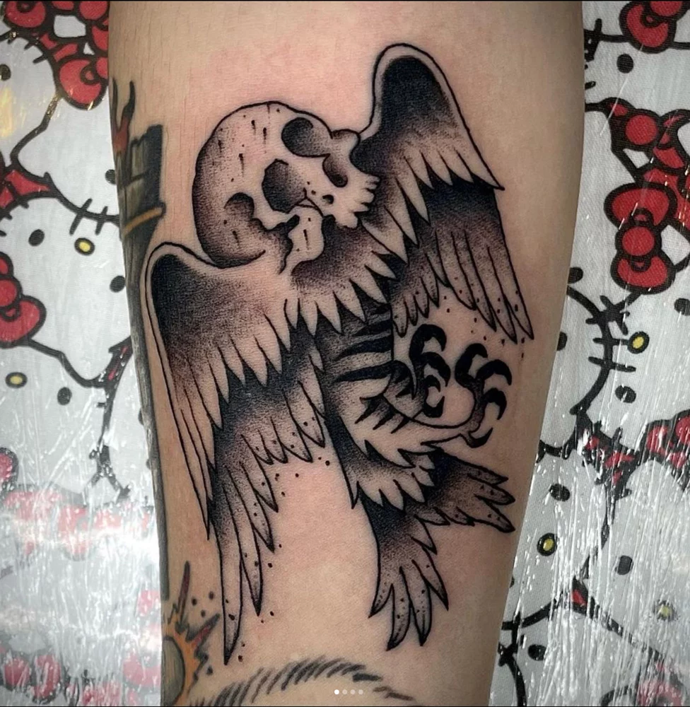blackwork tattoo dallas dark wings skull