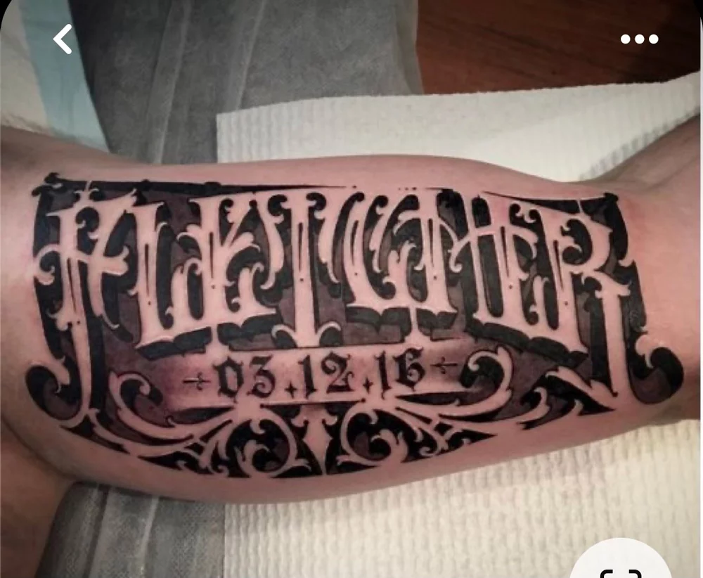 fancy lettering custom blackwork tattoo dallas dark