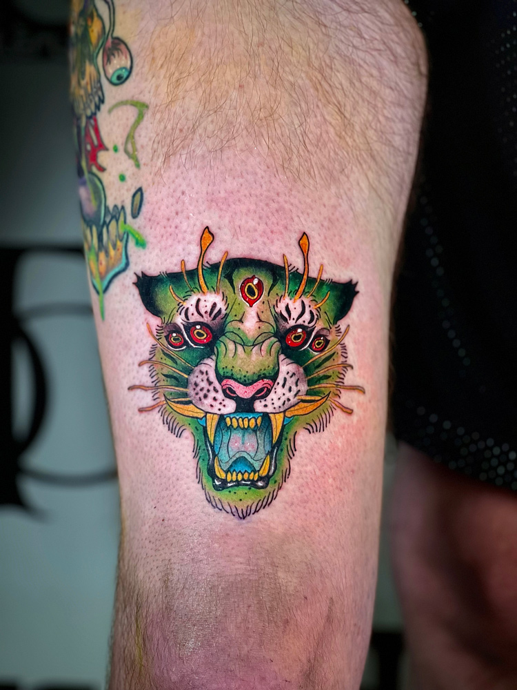 tattoo dallas tiger green alien