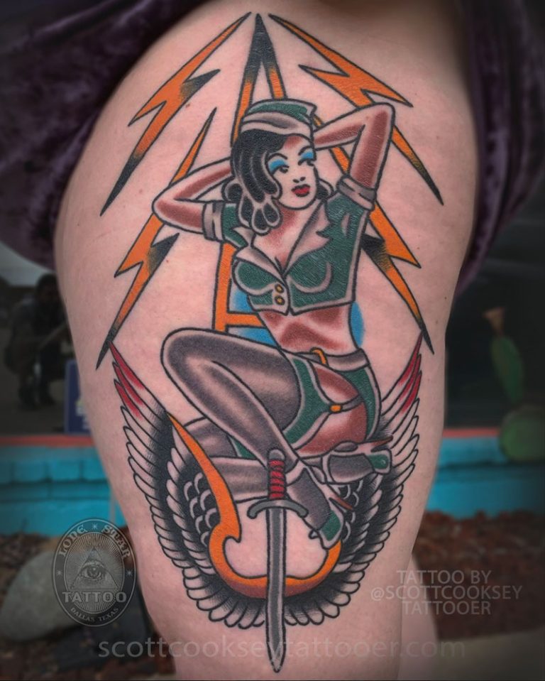 Traditional army pin up girl tattoo by Scott Cooksey