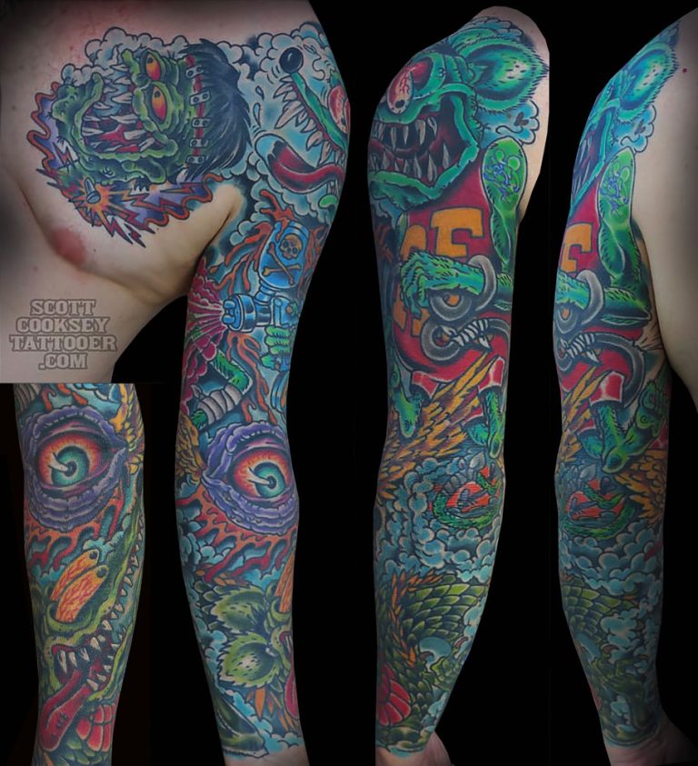 Traditional rat fink all seeing eye dragon sleeve tattoo by Scott Cooksey