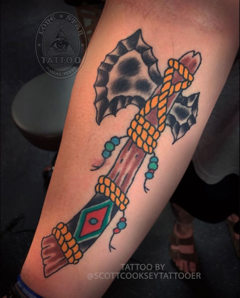 Traditional tomahawk axe weapon tattoo by Scott Cooksey
