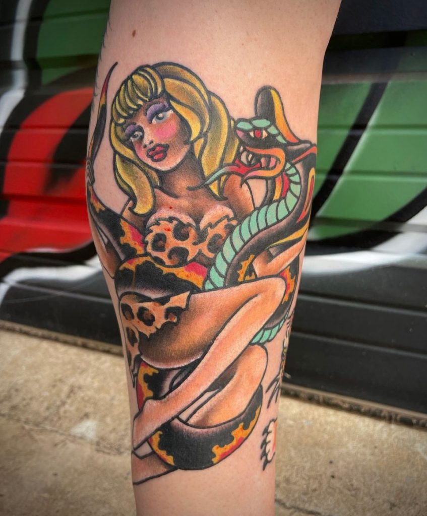 chris mcneill traditional jungle girl snake tattoo dallas