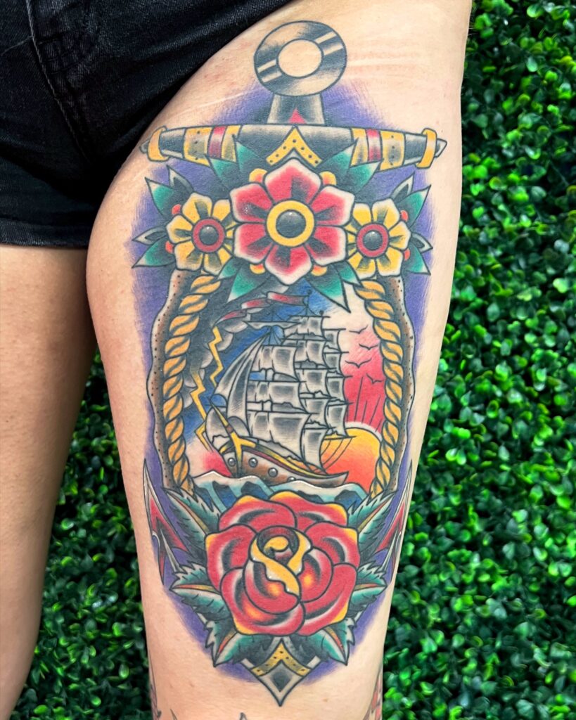 Traditional clipper ship, anchor and rose tattoo